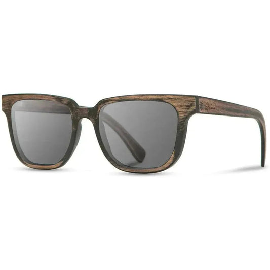 Side view of the Shwood Prescott sunglasses in Distressed Dark Walnut with gray lenses against a white background.
