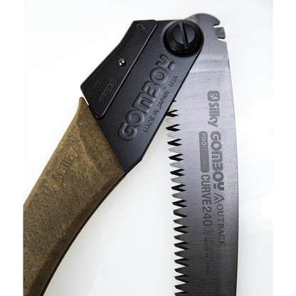 A close-up of the Silky Gomboy Curve Professional 240mm Outback Edition saw with a brown handle and black metal frame against a white background.