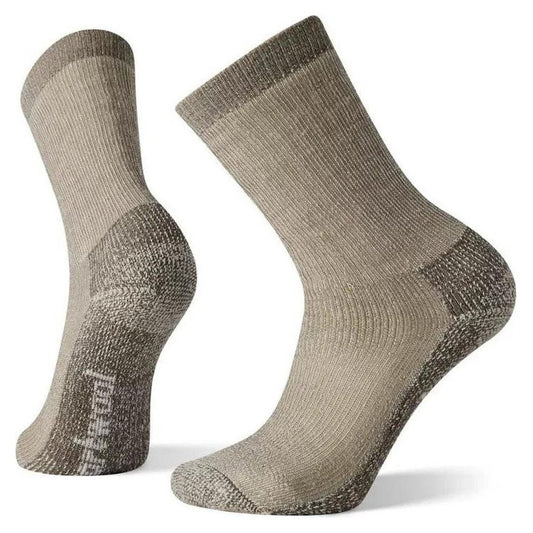 Side view of the Smartwool Classic Hike Extra Cushion Crew socks in Navy showing the cushioned heel and toe against a white background.