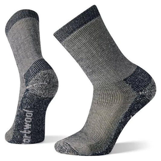 Side view of the Smartwool Classic Hike Extra Cushion Crew socks in Navy with visible cushioning and a white background.