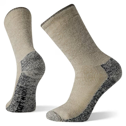 Side view of the Smartwool Classic Mountaineer Maximum Cushion Crew socks in Charcoal showing the thick cushioned heel and toe against a white background.