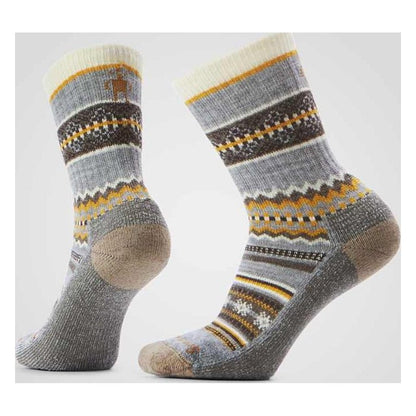 Side view of the Smartwool Everyday Cozy Snowed In Sweater Crew Socks in Garden Pink showing the pattern and heel against a light background.