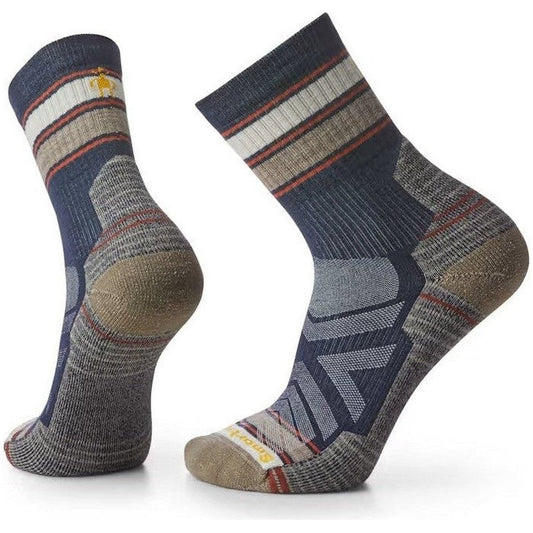 Side view of the Smartwool Hike Light Cushion Striped Mid Crew Socks in Navy showing the striped pattern and cushioned heel against a white background.