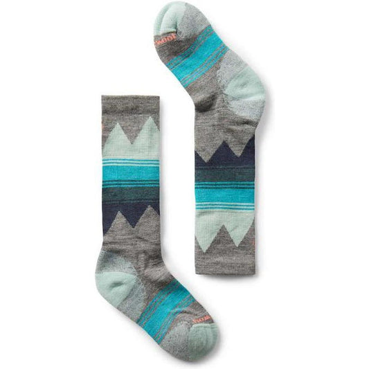Side view of the Smartwool Kids' Ski Over The Calf Socks in Medium Gray showing the pattern against a white background.
