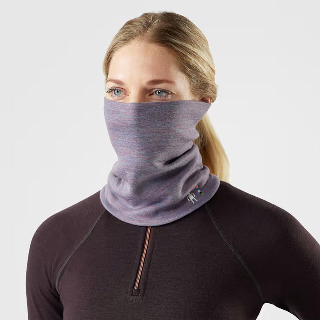 A model wears the Smartwool Thermal Reversible Neck Gaiter in Black/Black against a plain white background.