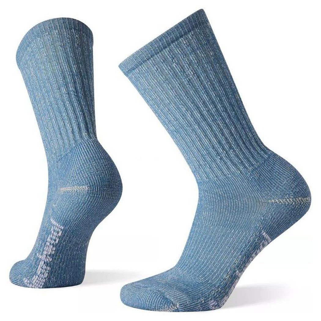 Side view of the Smartwool Women's Classic Hike Light Cushion Crew in Mist Blue showing the ribbed cuff and cushioned footbed against a white background.