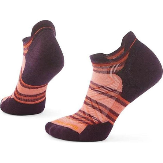 Two Smartwool Women's Run Targeted Cushion Stripe Low Ankle Socks in Wild Salmon are shown from a side angle against a white background.