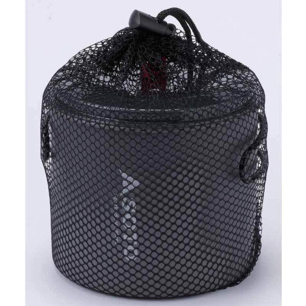 A black mesh bag holds the Soto Outdoors Amicus Stove with Igniter + New River Pot, visible through the netting, against a plain white background.
