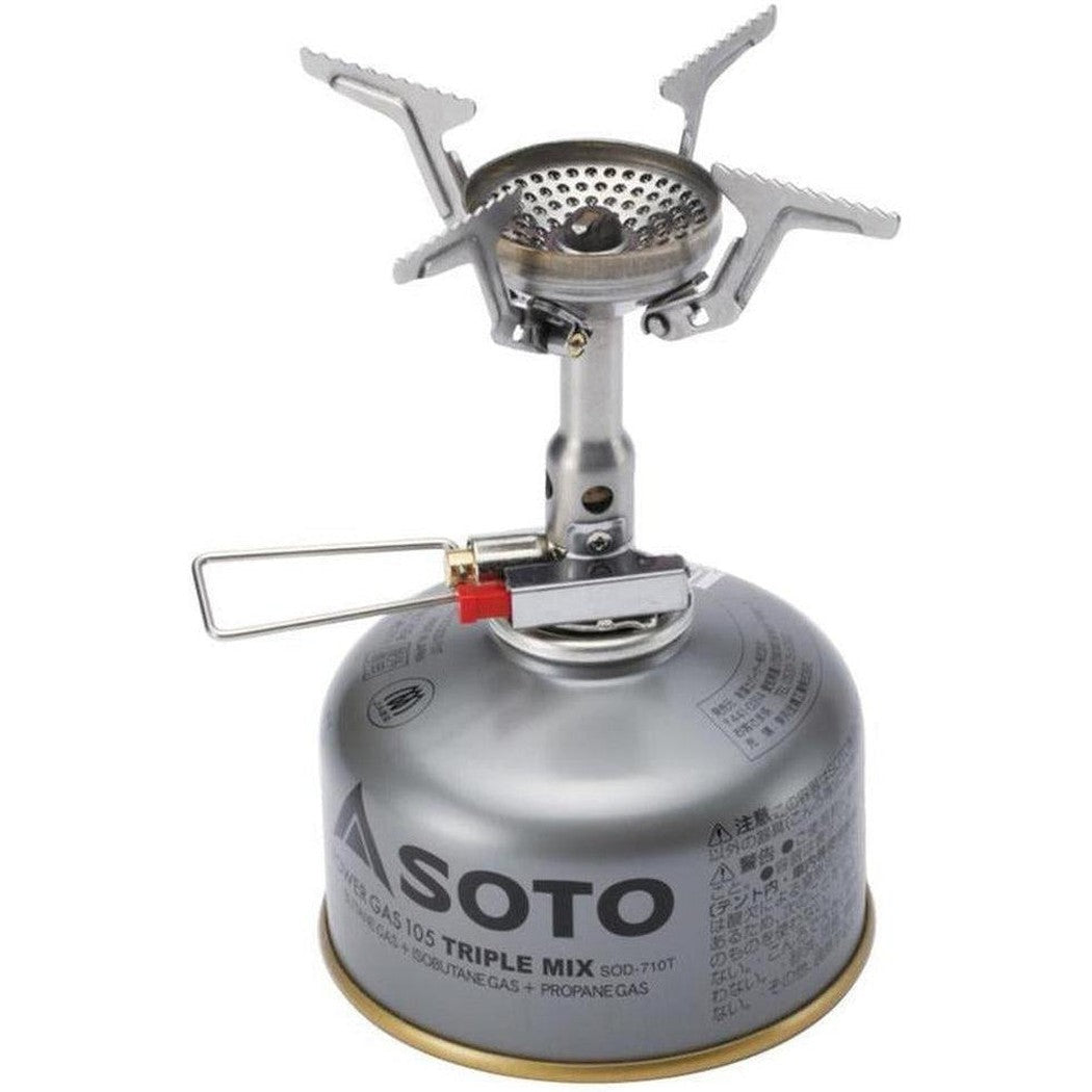A top-down view of the Soto Outdoors Amicus camping stove with its igniter attached, sitting on a silver gas canister.