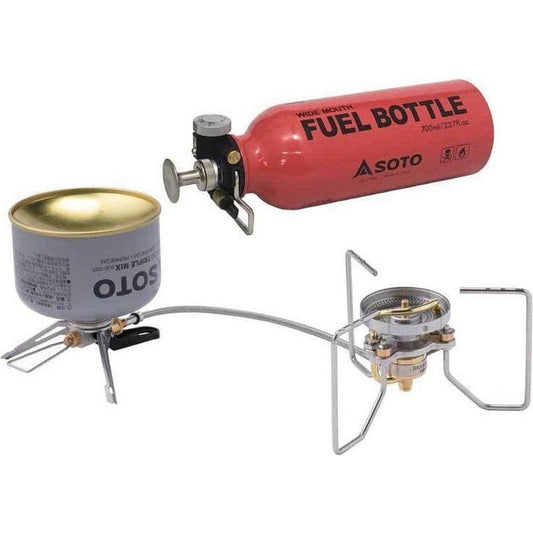 A red Soto fuel bottle and a gray Soto canister connect to a silver Soto stove on a white background.