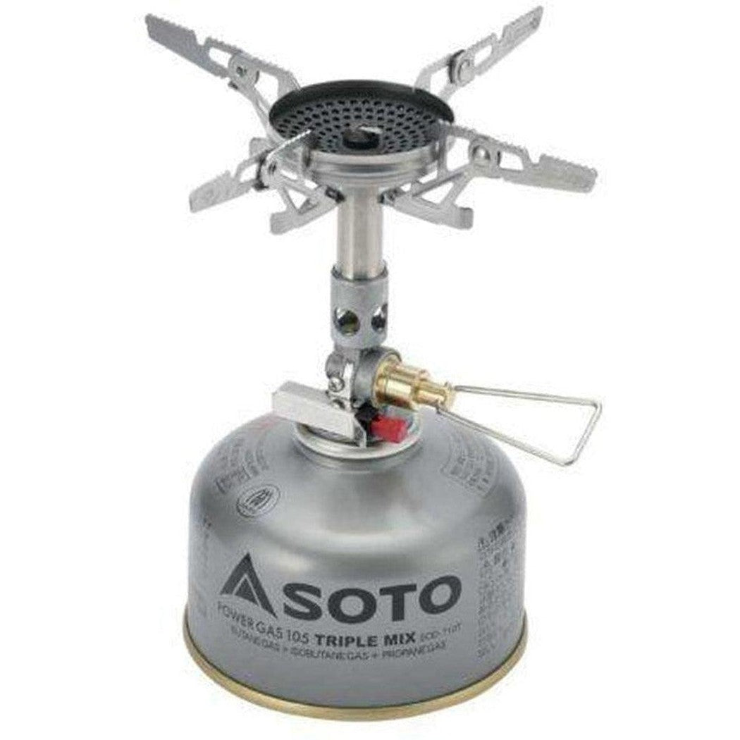 A top-down view of the Soto Outdoors WindMaster stove with its 4Flex windscreen and Micro Regulator attached to a silver canister.