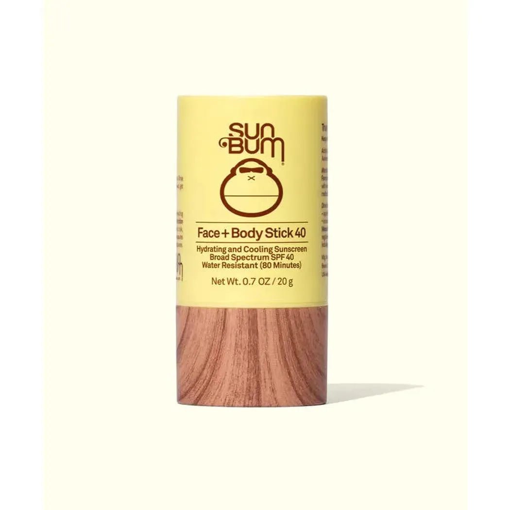A front view of the Sun Bum OG SPF 50 Face + Body Stick with a yellow top and brown bottom section against a white background.