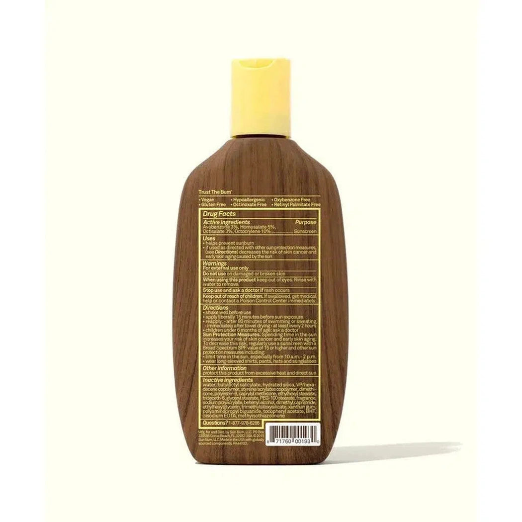 Back view of the Sun Bum SPF 30 Sunscreen Lotion bottle with yellow cap against a white background.