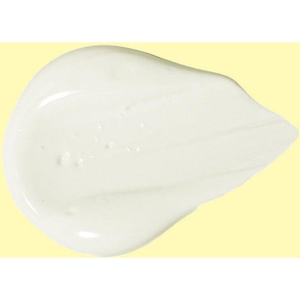 A dollop of Sun Bum SPF 50 Clear Face Sunscreen Lotion against a yellow background.