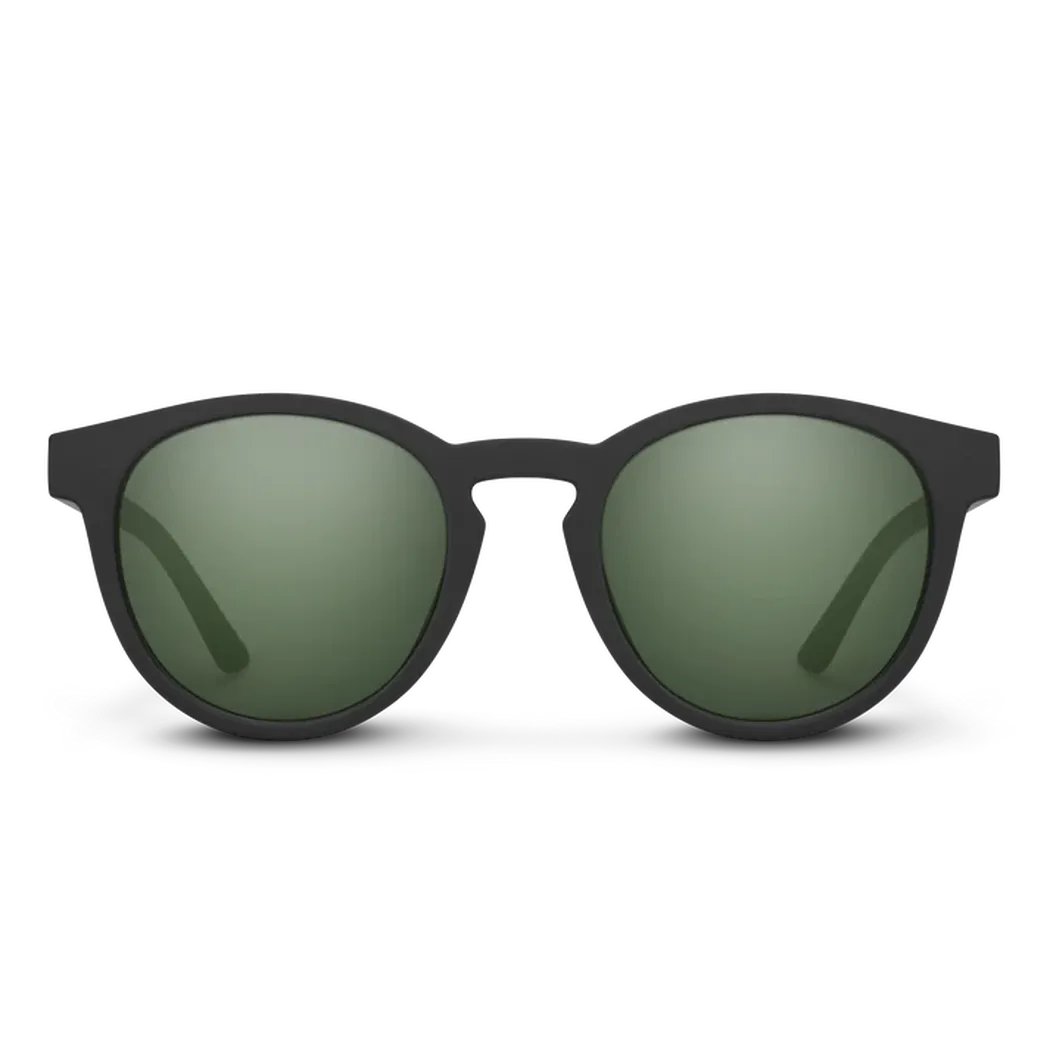Matte Black Suncloud Barnes sunglasses with round frames and green lenses, shown front on against a white background.