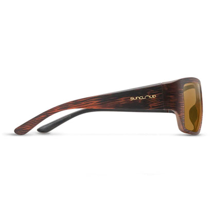Side view of the Suncloud Sculpin sunglasses with matte black frames and brown lenses against a white background.
