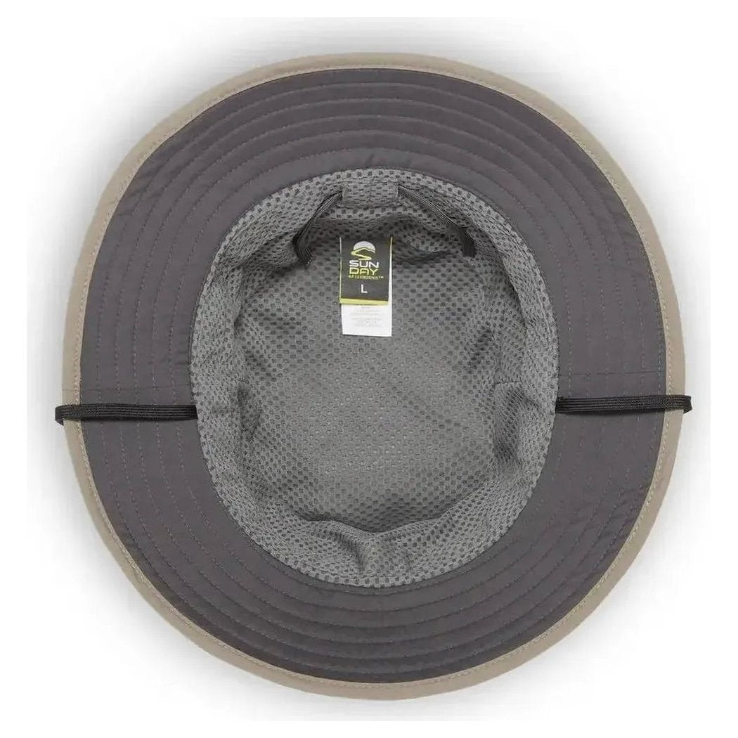 Top view of the Sunday Afternoons Ultra Storm Bucket hat in Carbon color showing the interior mesh lining and size tag against a white background.