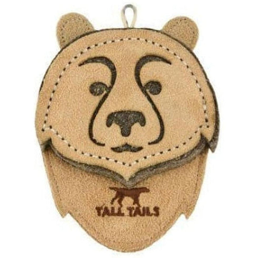 A natural, complete sentence describing the photo: A front view of the Tall Tails Bear Toy in 4" showing the stitched bear face and logo on a white background.