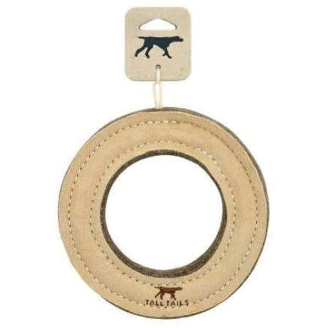 A natural leather ring toy from Tall Tails with a dog logo on the tag and a brown dog logo on the toy itself.