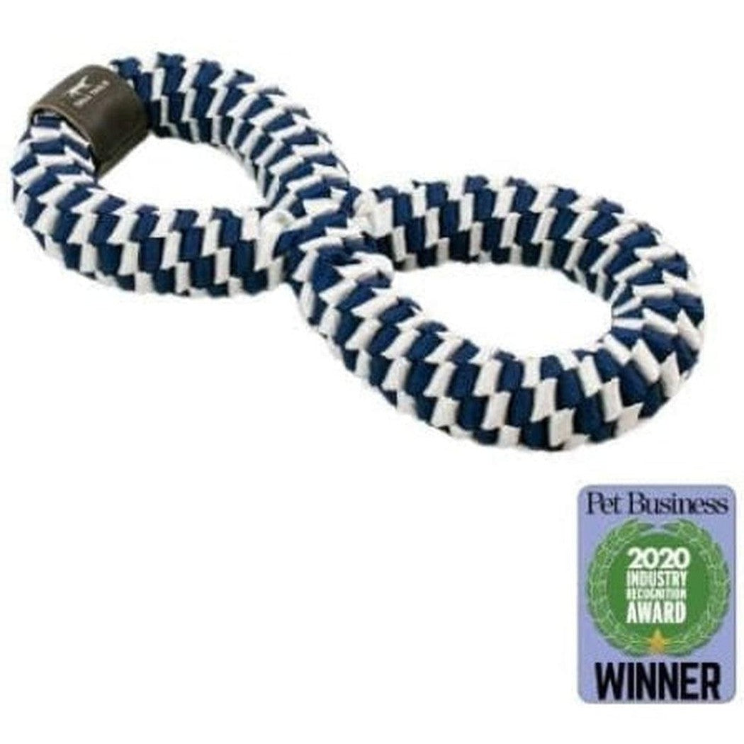 A side view of the Tall Tails Navy Braider Infinity Tug Toy with a black clasp, against a white background, and a 2020 Pet Business Industry Award Winner badge.