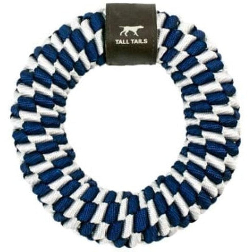 A close-up of the Tall Tails Navy Braider Ring Toy with a dark tag in the center, set against a white background.