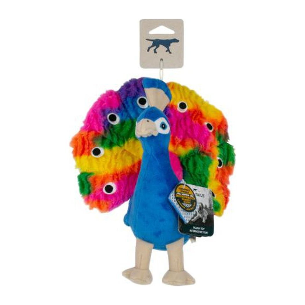 A front view of the Tall Tails Plush Peacock Squeaker Toy with rainbow-colored eyes and a tag, against a white background.