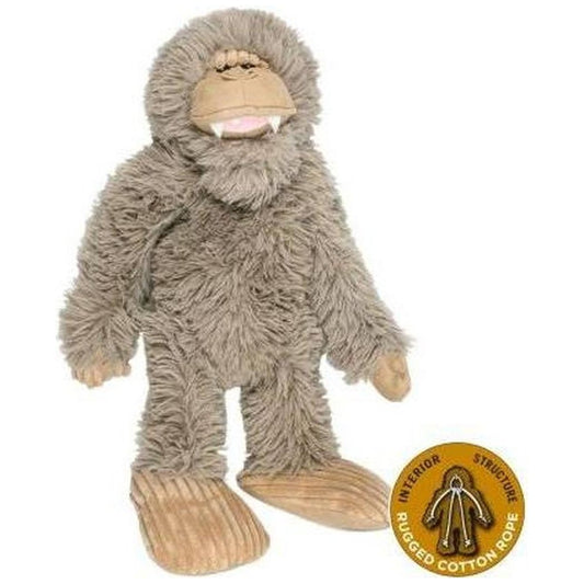 A front view of the Tall Tails Stuffless Big Foot with Squeaker - 20" plush toy against a white background with a product badge.