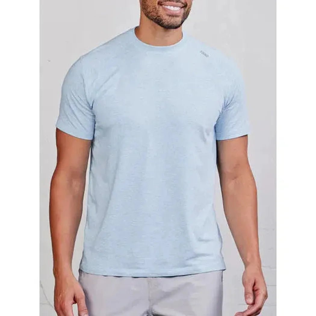 A front view of the Tasc Carrollton Fitness T-Shirt in Heather Gray on a model against a light background.