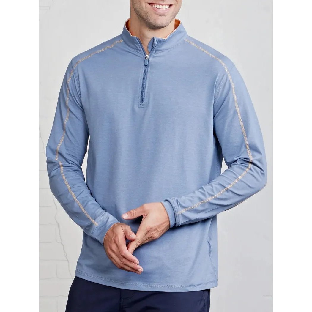 A front view of the Tasc Men's Carrollton 1/4 Zip in Classic Navy Heather/Waterfall Heather on a model against a light background.