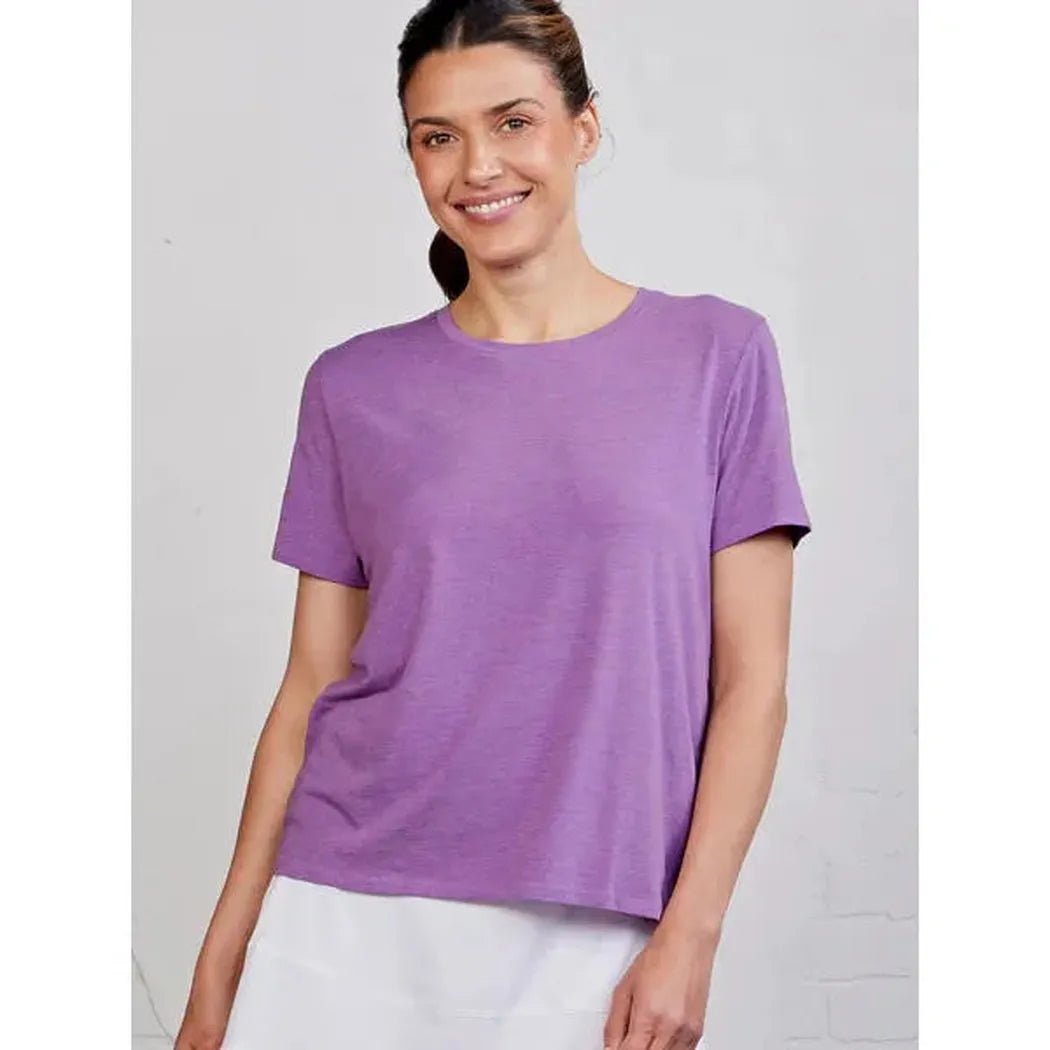 A front view of the Tasc Women's All Day T in Coast color on a model wearing it against a light background.