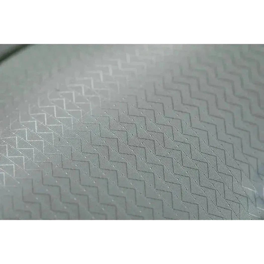 A close-up of the Tensor All-Season Ultralight Insulated Sleeping Pad showing its textured surface and zigzag pattern.