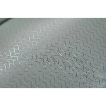 A close-up of the Tensor All-Season Ultralight Insulated Sleeping Pad showing its textured surface and zigzag pattern.