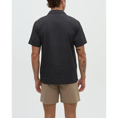Back view of the Tentree Men's Chambers Pocket Shirt in Meteorite Black/Khaki on a model wearing khaki shorts against a white background.