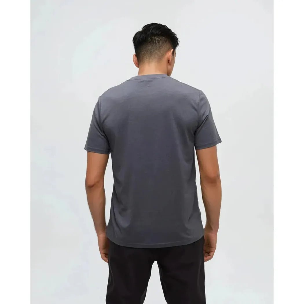 Back view of the Tentree Men's Sasquatch Sends It T-Shirt in Graphite Paloma Grey on a model against a plain white background.