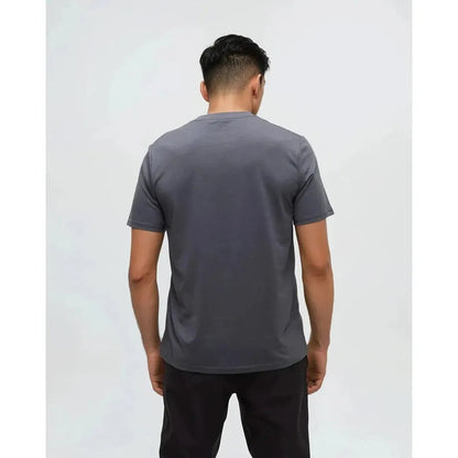 Back view of the Tentree Men's Sasquatch Sends It T-Shirt in Graphite Paloma Grey on a model against a plain white background.
