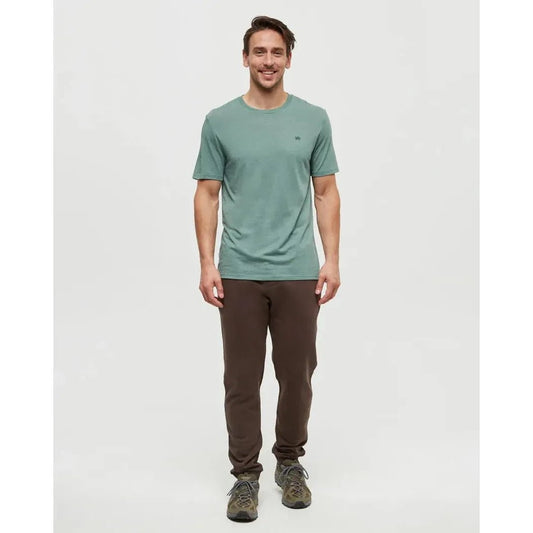 A front view of the Tentree Men's TreeFleece Atlas Sweatpant in Kona, showing a model wearing it against a plain white background.
