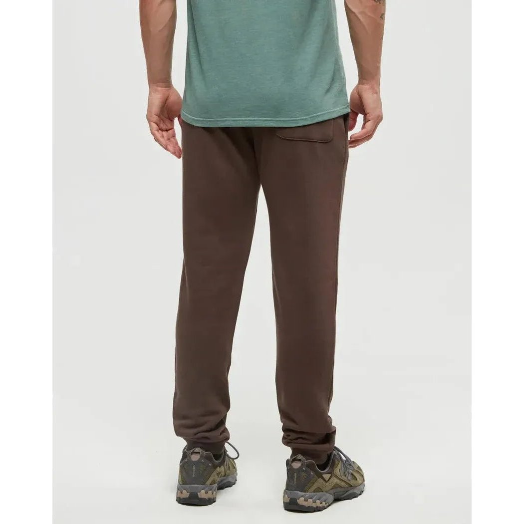 Back view of the Tentree Men's TreeFleece Atlas Sweatpant in Kona, showing the model wearing them against a plain white background.