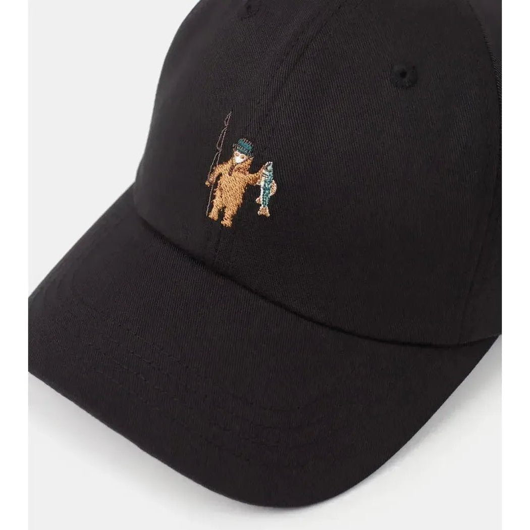 A black Tentree Sasquatch Peak Hat with a brown Sasquatch embroidery on the front, photographed from a slightly angled top-down view against a white background.
