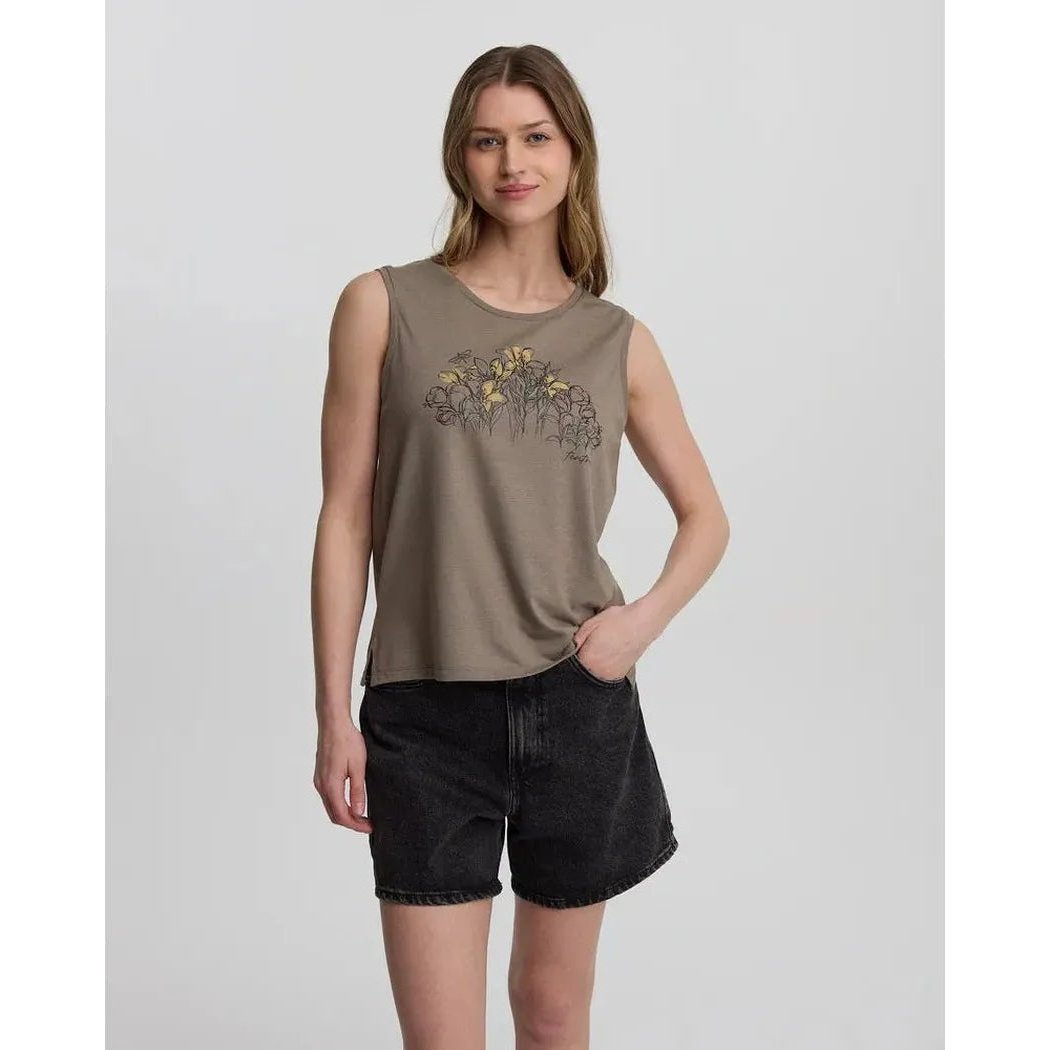 A front view of the Tentree Women's Lakeside Florals Tank in Clay/Timber on a model wearing black shorts against a plain background.
