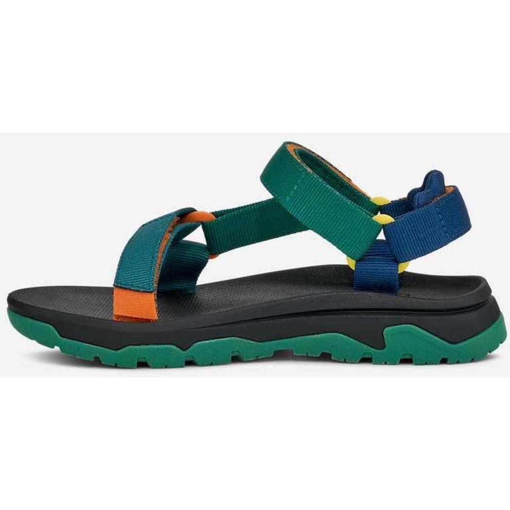 Side view of the Teva Kid's Hurricane XLT JR in Blue Coral Multi showing the adjustable straps and rugged outsole against a white background.