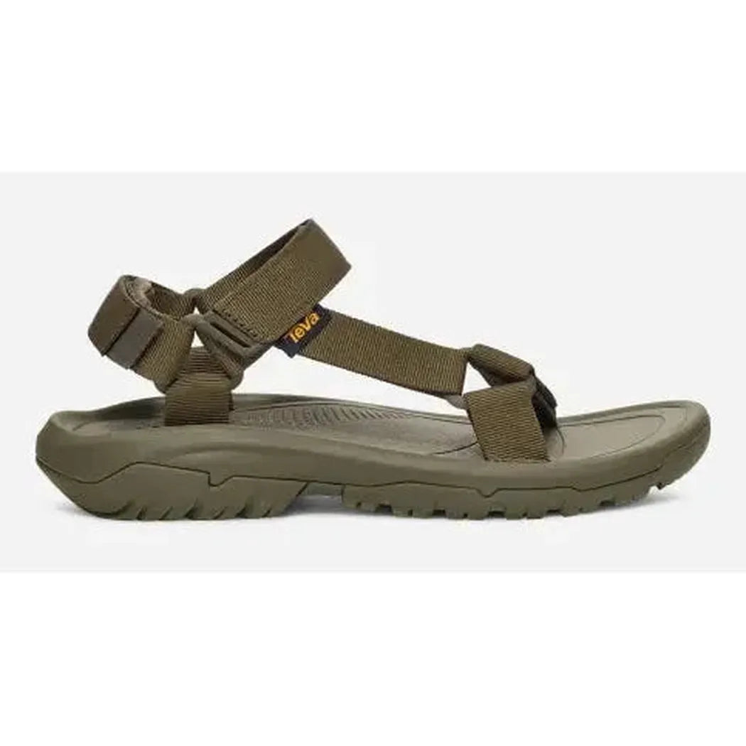 Side view of the Teva Men's Hurricane XLT2 Sandal in Archive Ladder Navy showing the adjustable straps and rugged outsole against a white background.