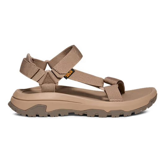 Side view of the Teva Men's Hurricane XLT3 in Criss Cross Navy/ Grey showing the adjustable straps and rugged outsole against a white background.