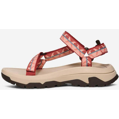 Side view of the Teva Women's Hurricane XLT3 in Criss Cross Bossa Nova showing the lugged outsole against a white background.