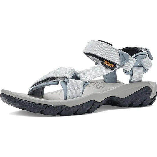 Side view of the Teva Women's Terra FI 5 Universal in Dawn Blue/Tradewinds showing the adjustable straps and lugged outsole against a white background.