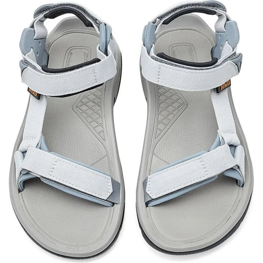 Top view of the Teva Women's Terra FI 5 Universal sandals in Dawn Blue/Tradewinds, showing the adjustable straps and textured outsole against a white background.
