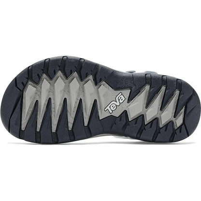 The sole of the Teva Women's Terra FI 5 Universal in Dawn Blue/Tradewinds is shown from below, displaying the lugged tread pattern against a white background.