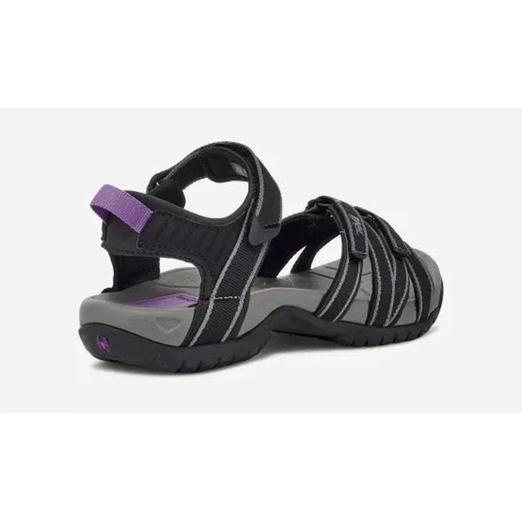 Back view of the Teva Women's Tirra in Black/Grey showing the adjustable straps and grey sole against a white background.