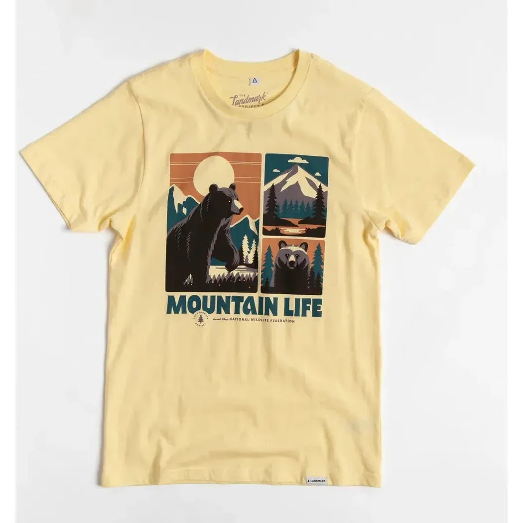 A front view of the yellow The Landmark Project Mountain Life Unisex Short Sleeve Tee showing the bear graphic and mountain design on a white background.