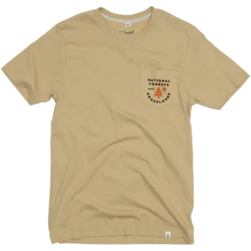 A front view of the Bay Leaf The Landmark Project National Forests and Grasslands Pocket Tee showing the chest pocket logo against a white background.