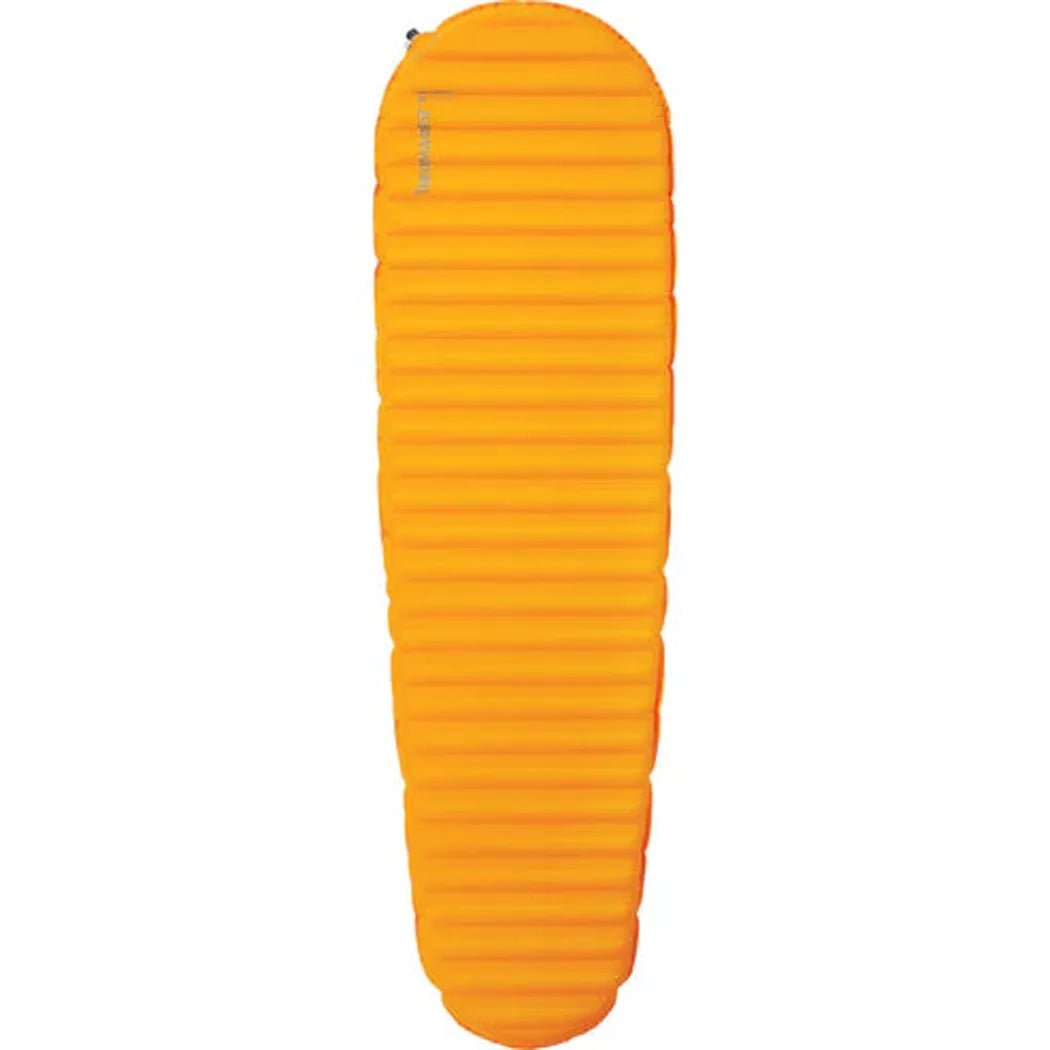 A side view of the orange Therm-a-Rest Trail Prolite sleeping pad against a white background.